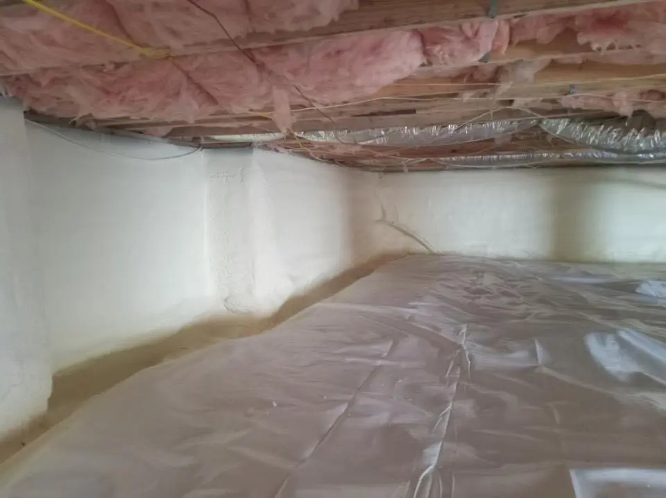 Crawl space encapsulation with closed-cell spray foam for Commercial Roof Restoration in Union